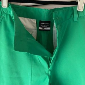 green Nike golf shorts